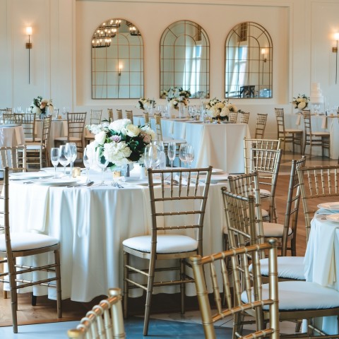 a room with tables and chairs