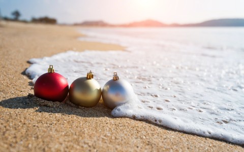 a group of ornaments on a sandy surface