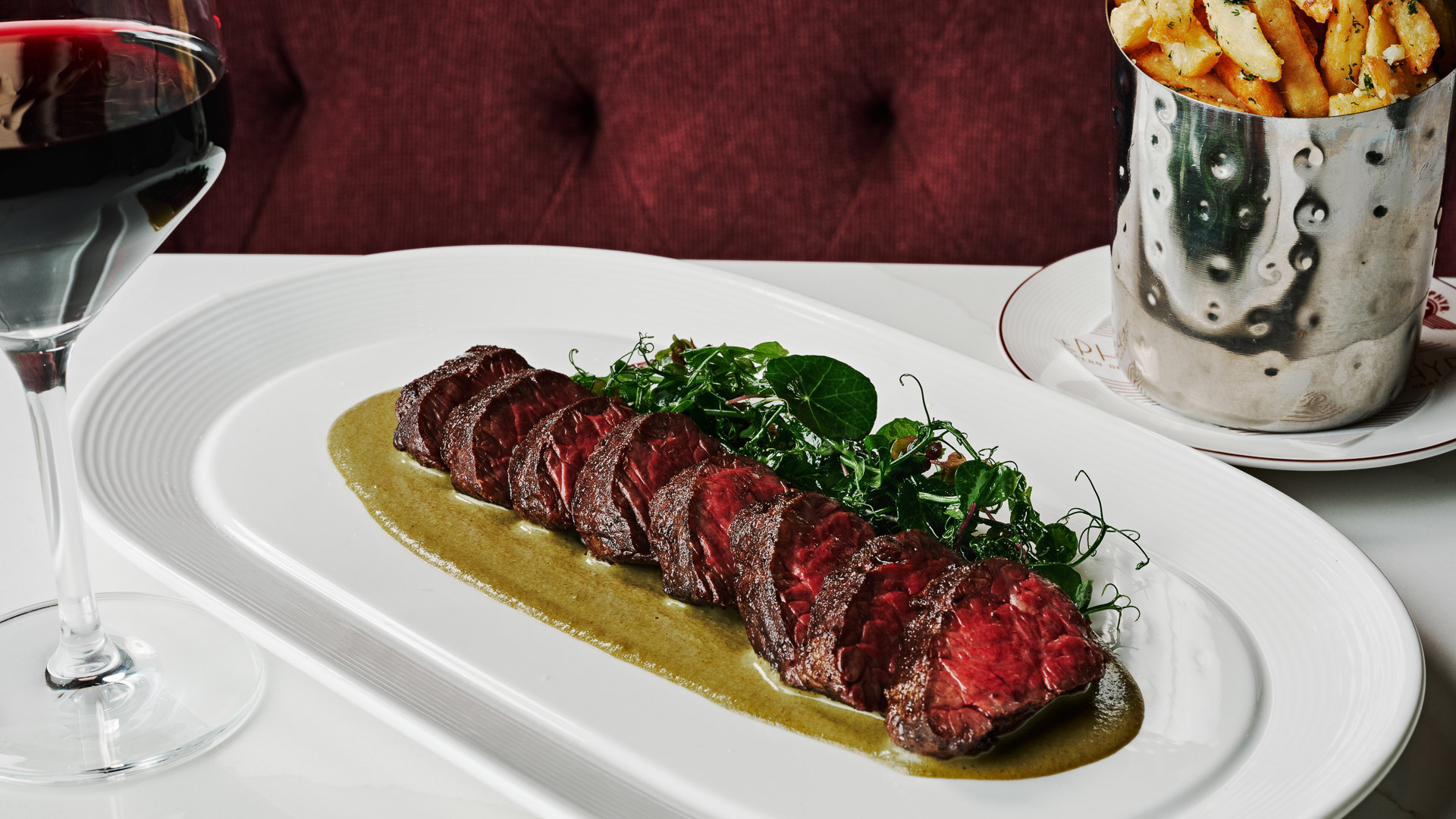 a plate of meat and vegetables