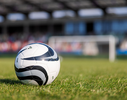 a football ball on the grass