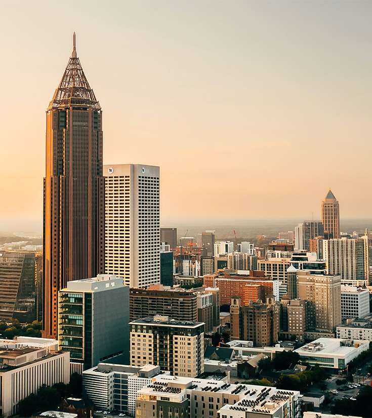 a city skyline with tall buildings