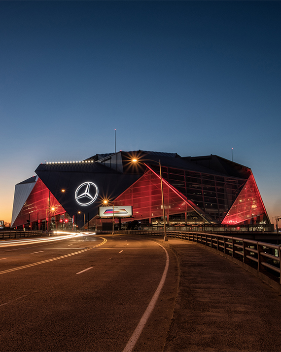 a large building with red lights