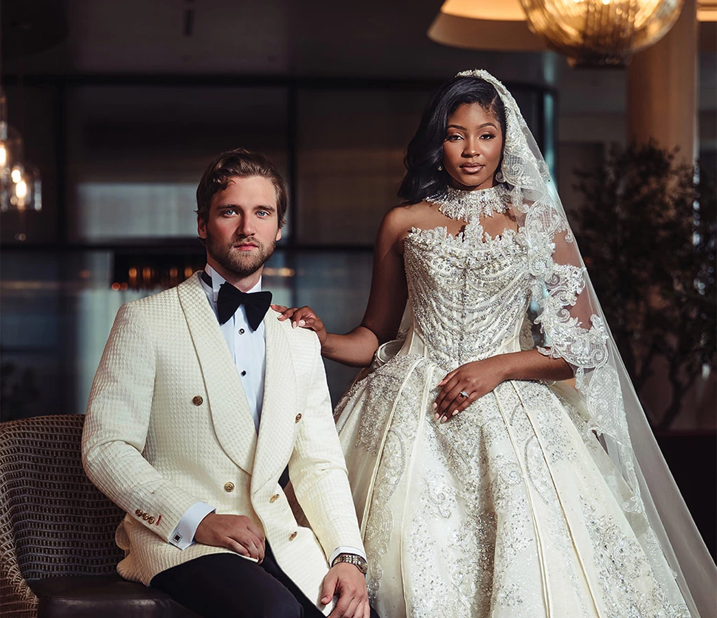a man and woman in wedding attire