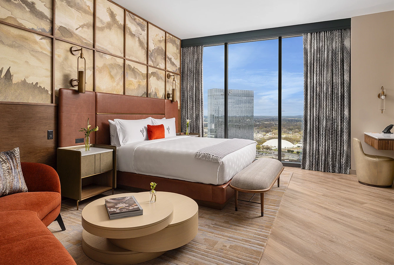 a bedroom with a large window