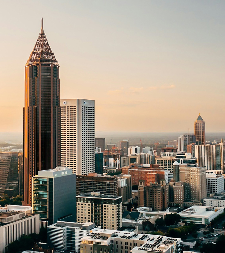 a city skyline with tall buildings
