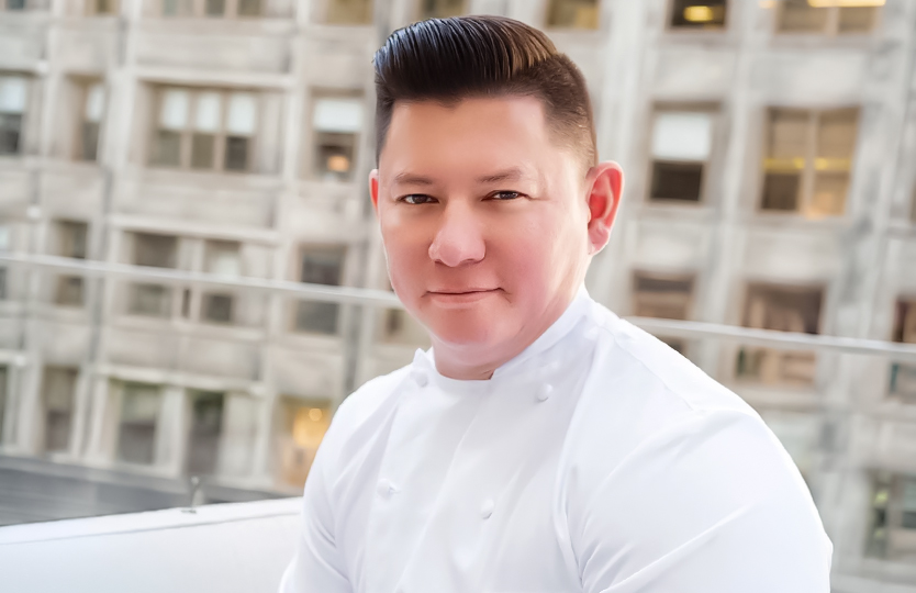 a man in a white chef coat