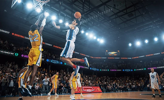 a basketball player dunking a ball