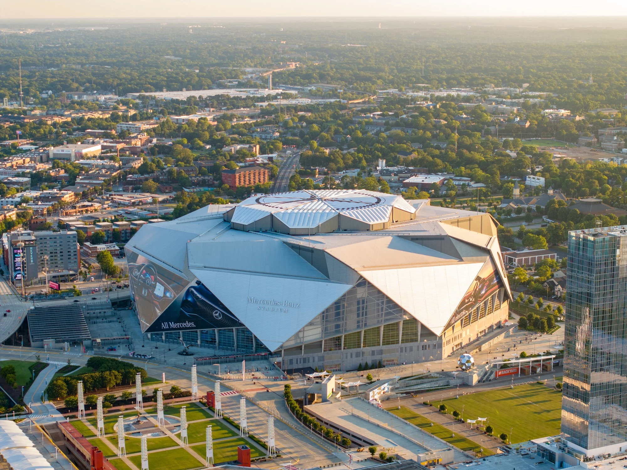 a large stadium with a large roof