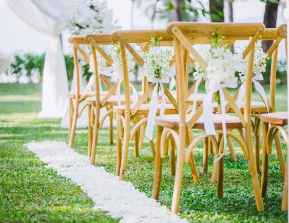 chairs with white flowers on them