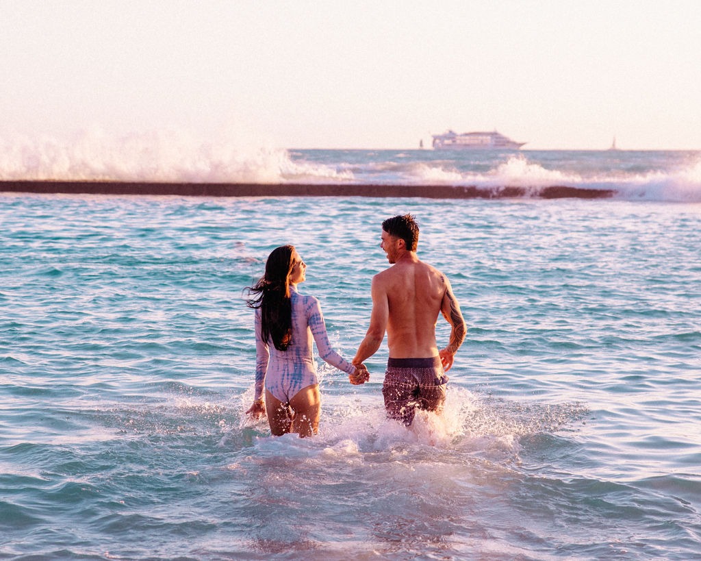 a man and woman in the water