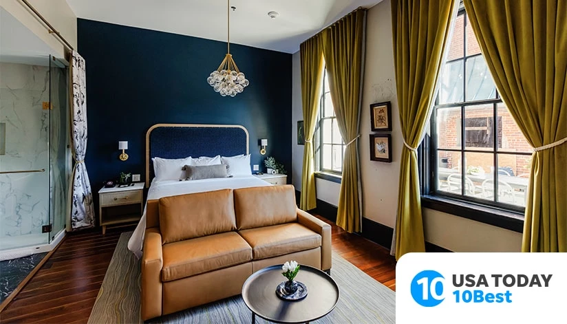 a room with a bed and couch