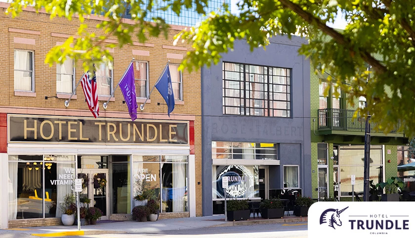 a building with flags on the front