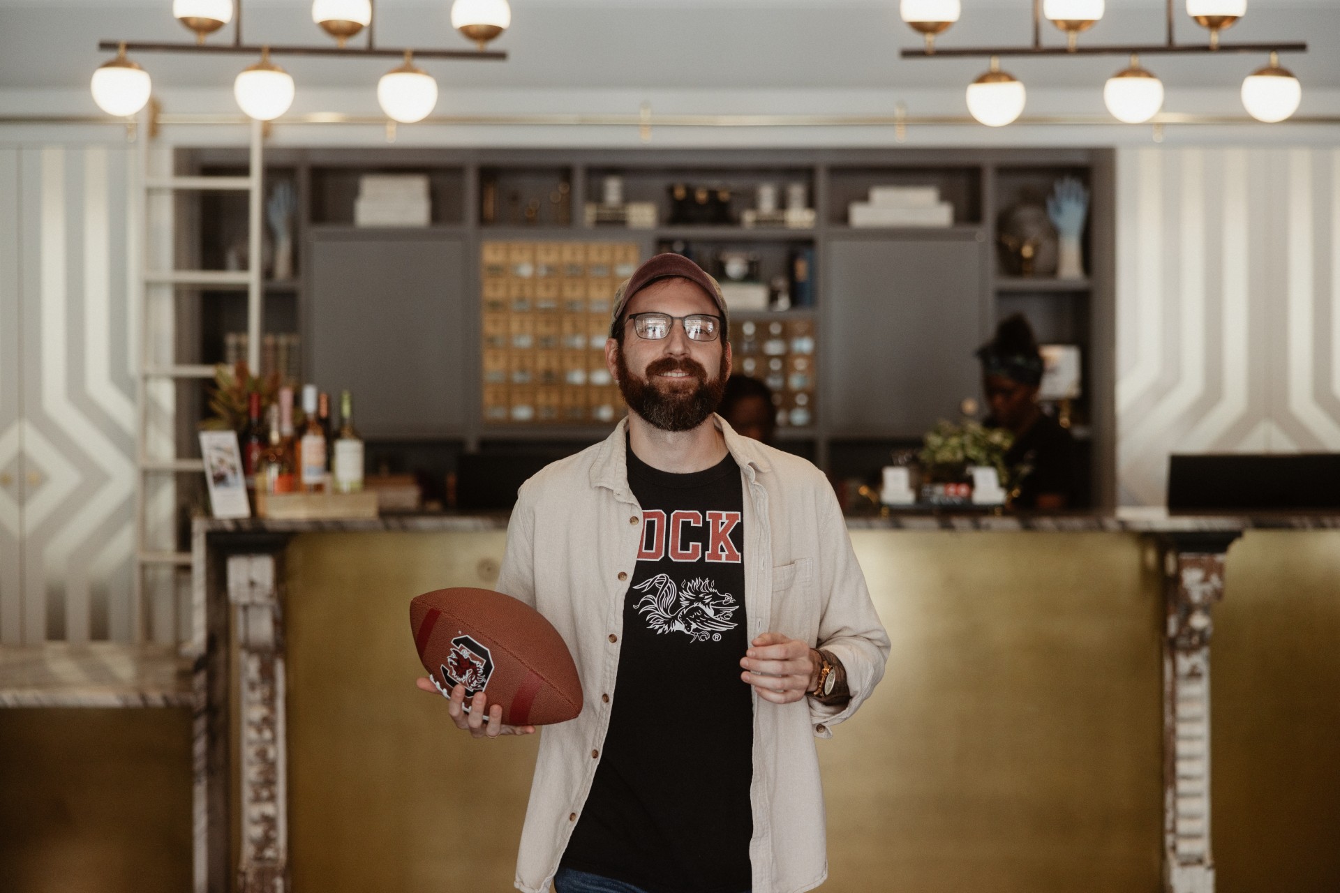 a man holding a football