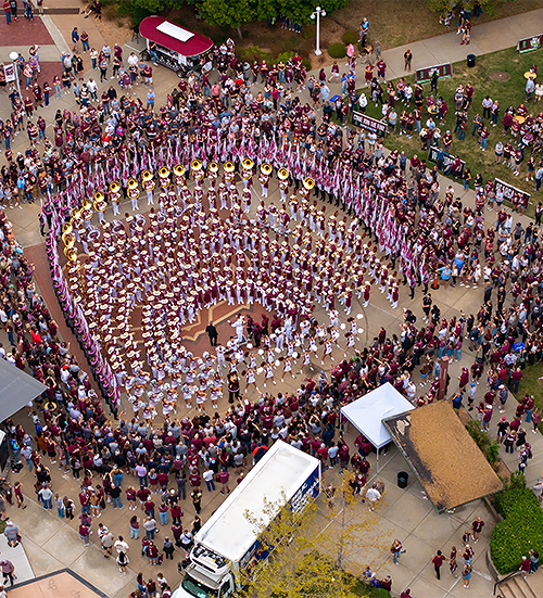 a group of people standing in a circle