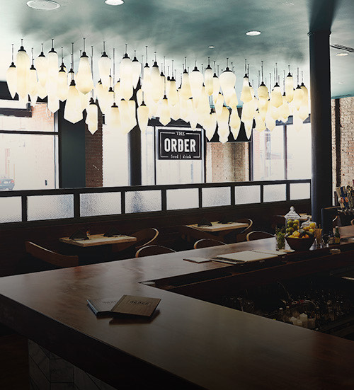 empty restaurant with hanging lamps