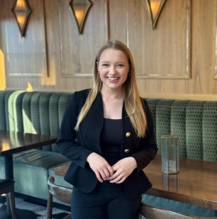 a woman in a black suit