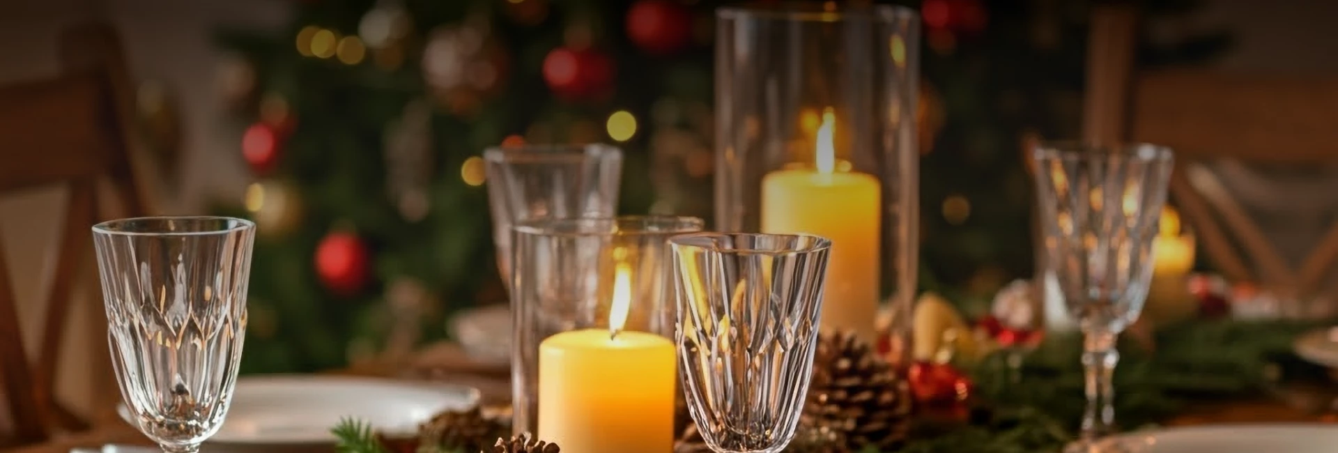 a group of glasses and candles