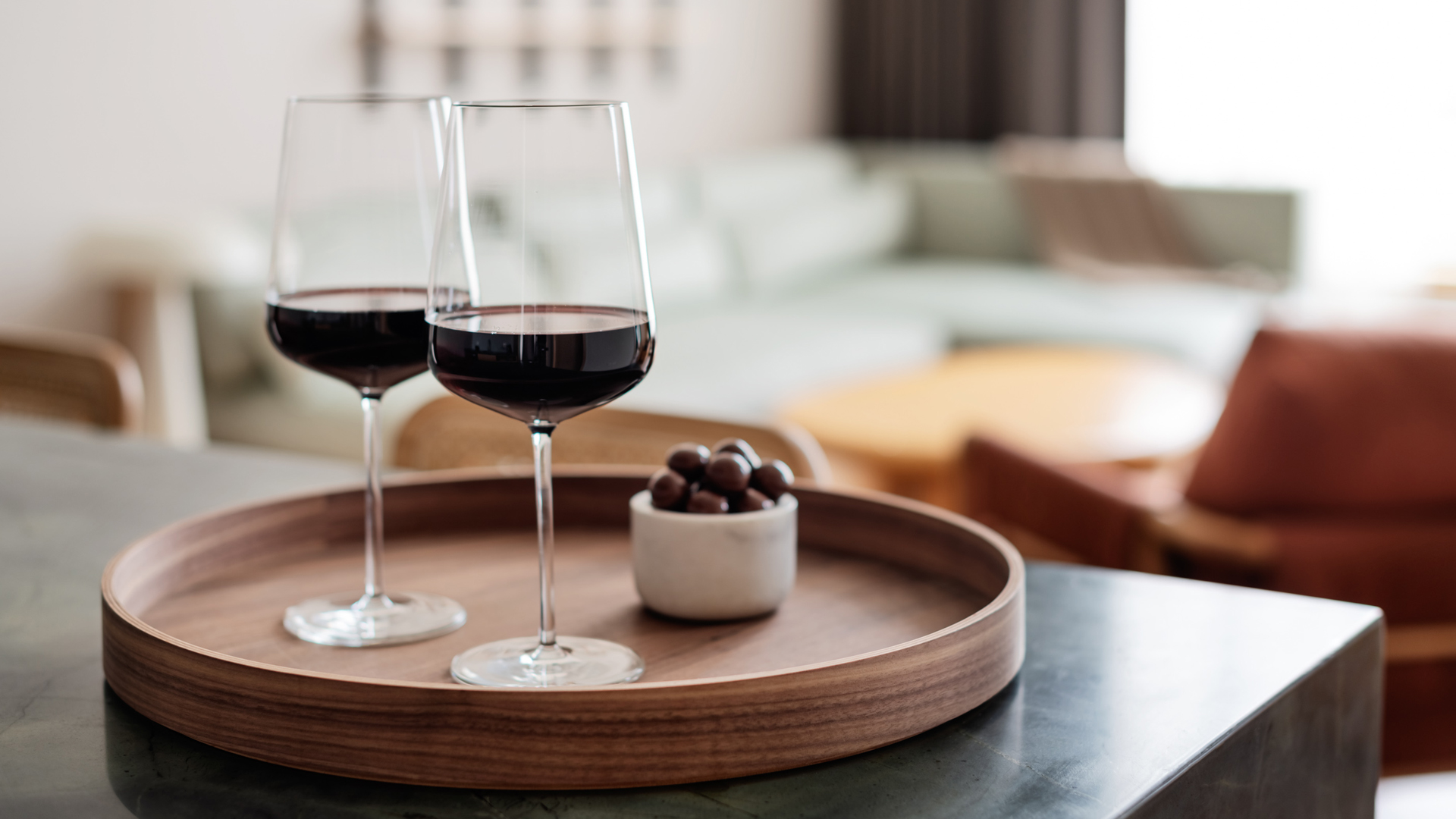 two glasses of wine on a table