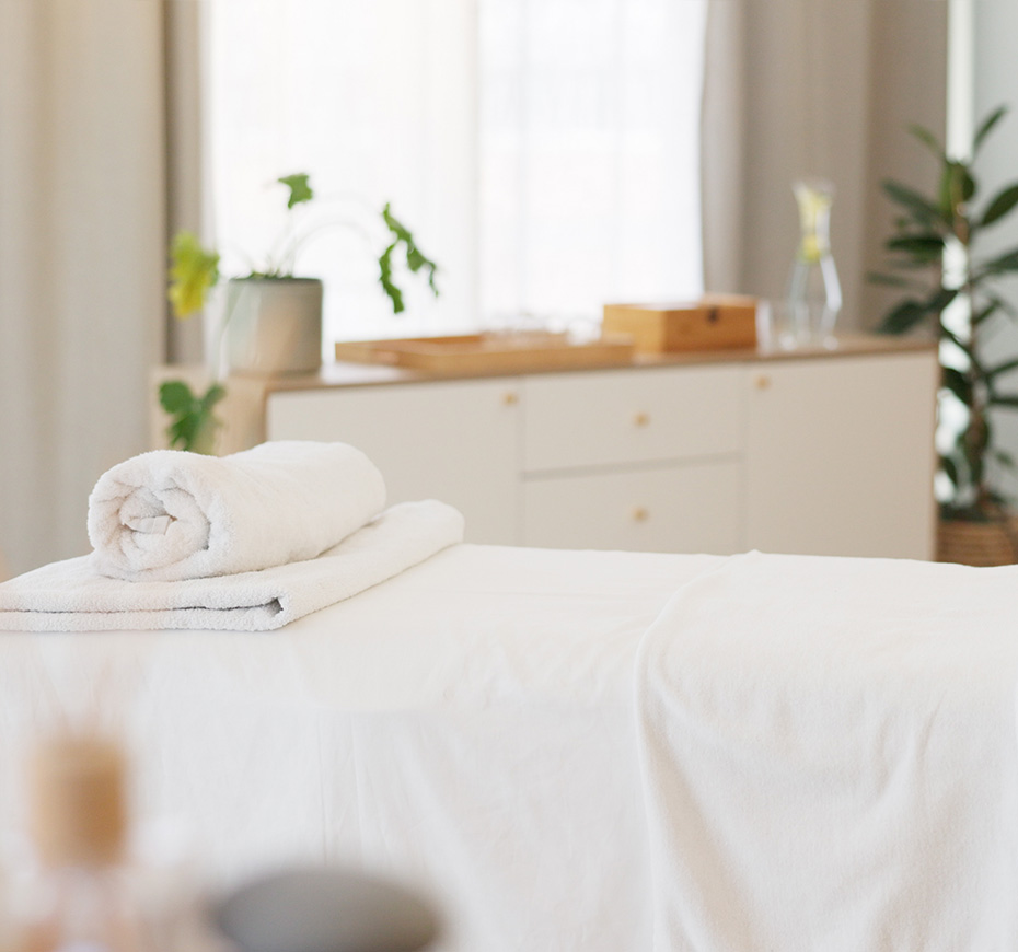 a white towel on a bed
