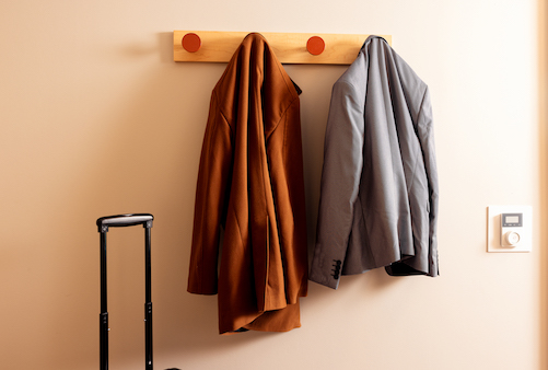 a pair of jackets on a wall