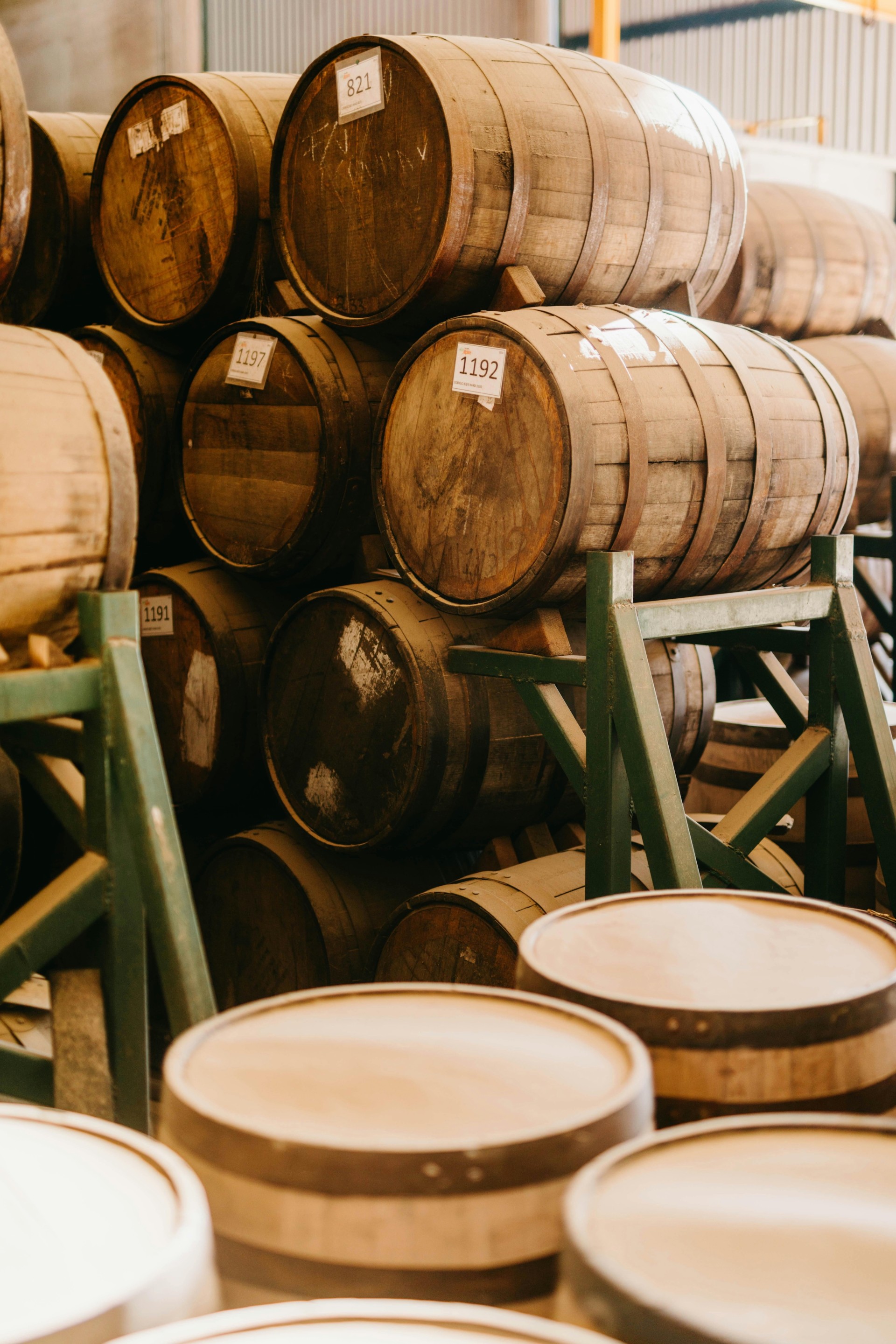 a group of wooden barrels stacked on top of each other