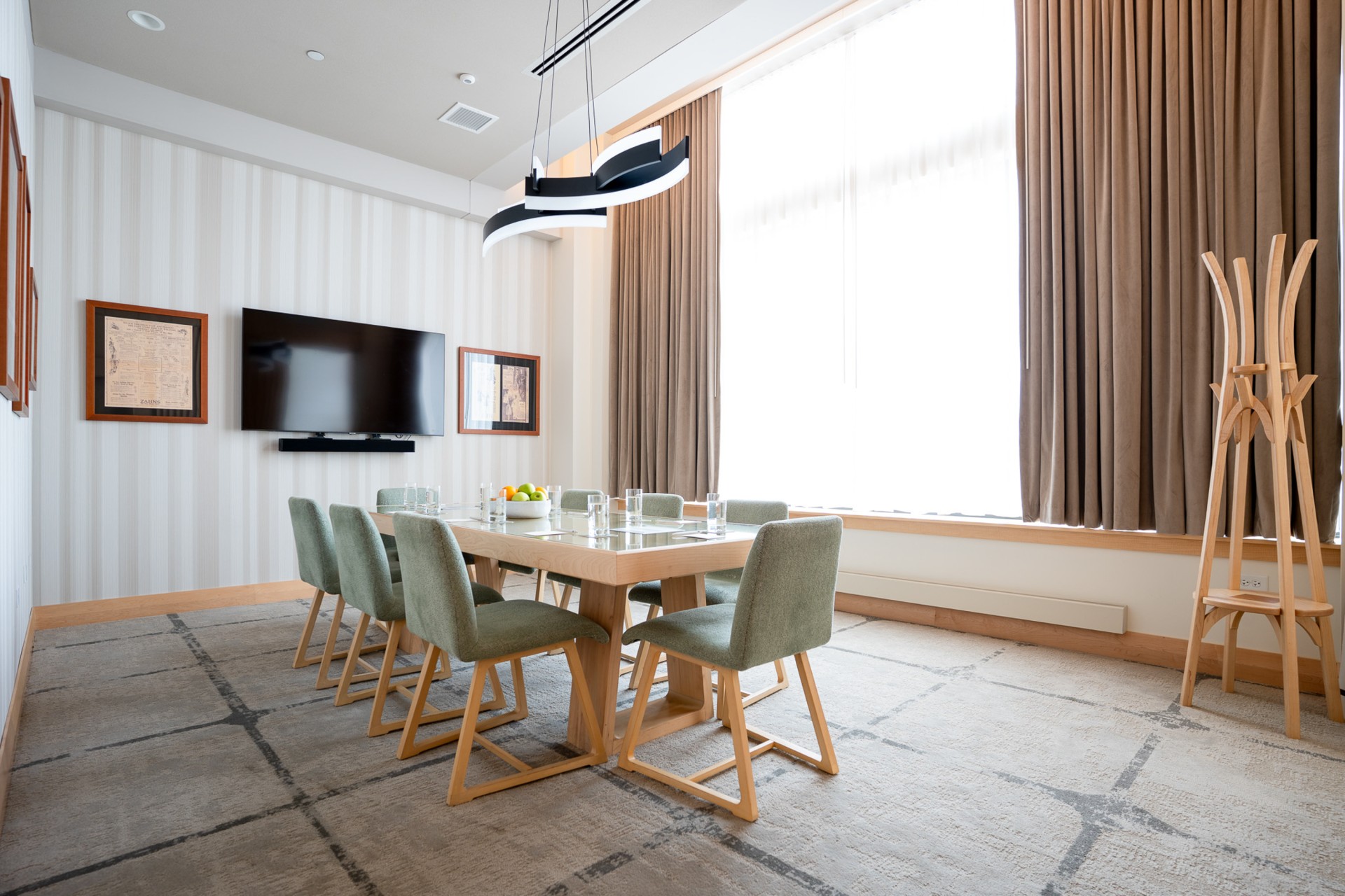 a room with a table and chairs