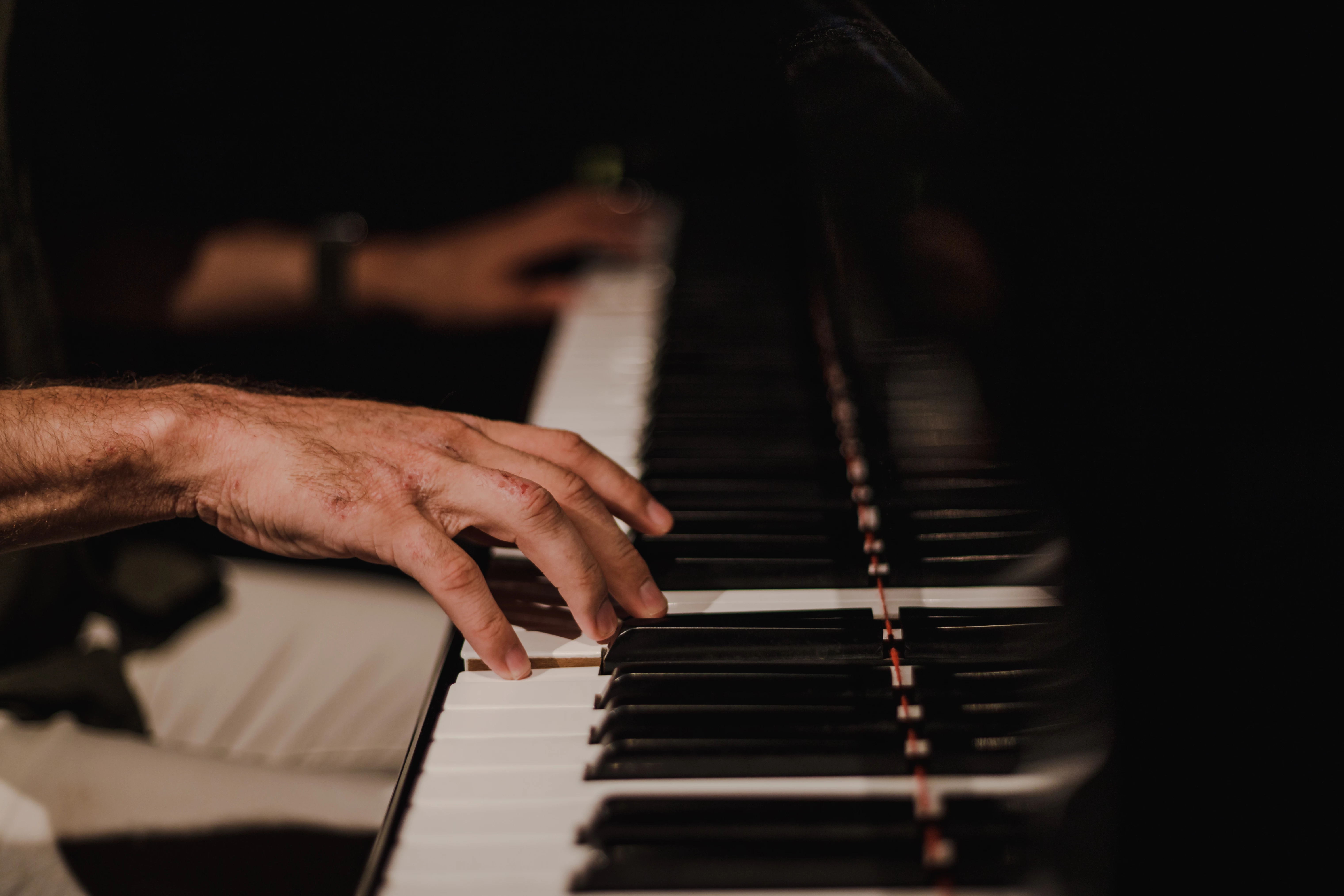 a person playing a piano
