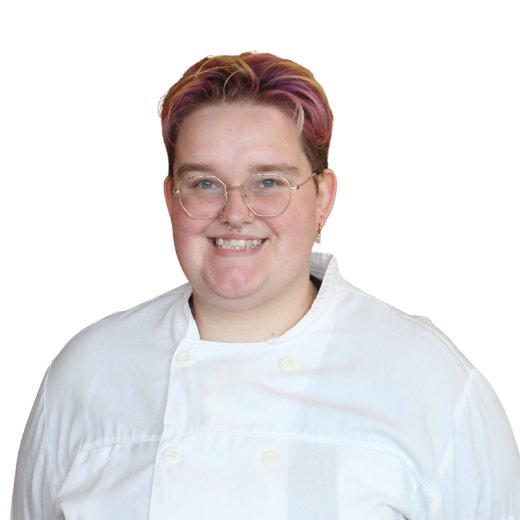 a woman wearing a white coat