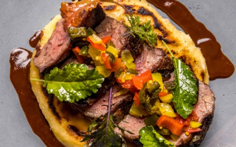 a meat and vegetables on a plate