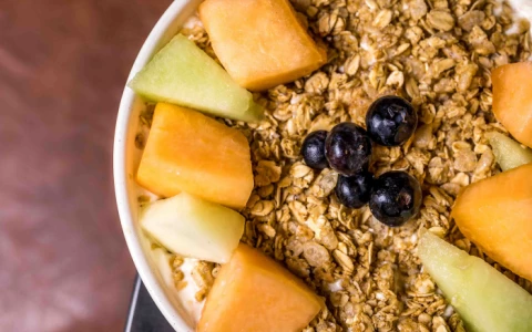 a bowl of oatmeal with fruit