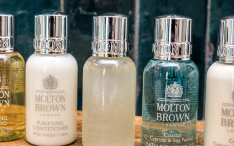 a group of small bottles of shampoo