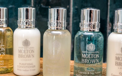 a group of small bottles of shampoo