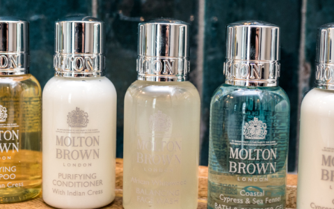 a group of small bottles of shampoo