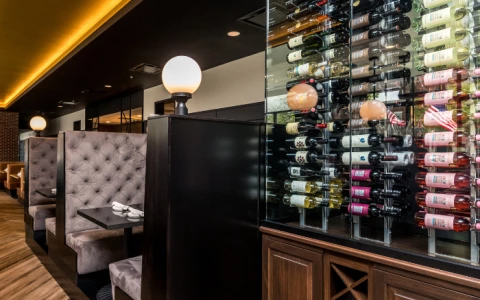 a wine rack with bottles of wine