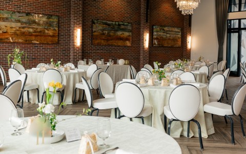 a room with tables and chairs