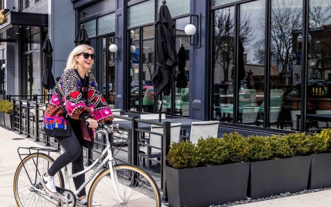 a woman riding a bicycle