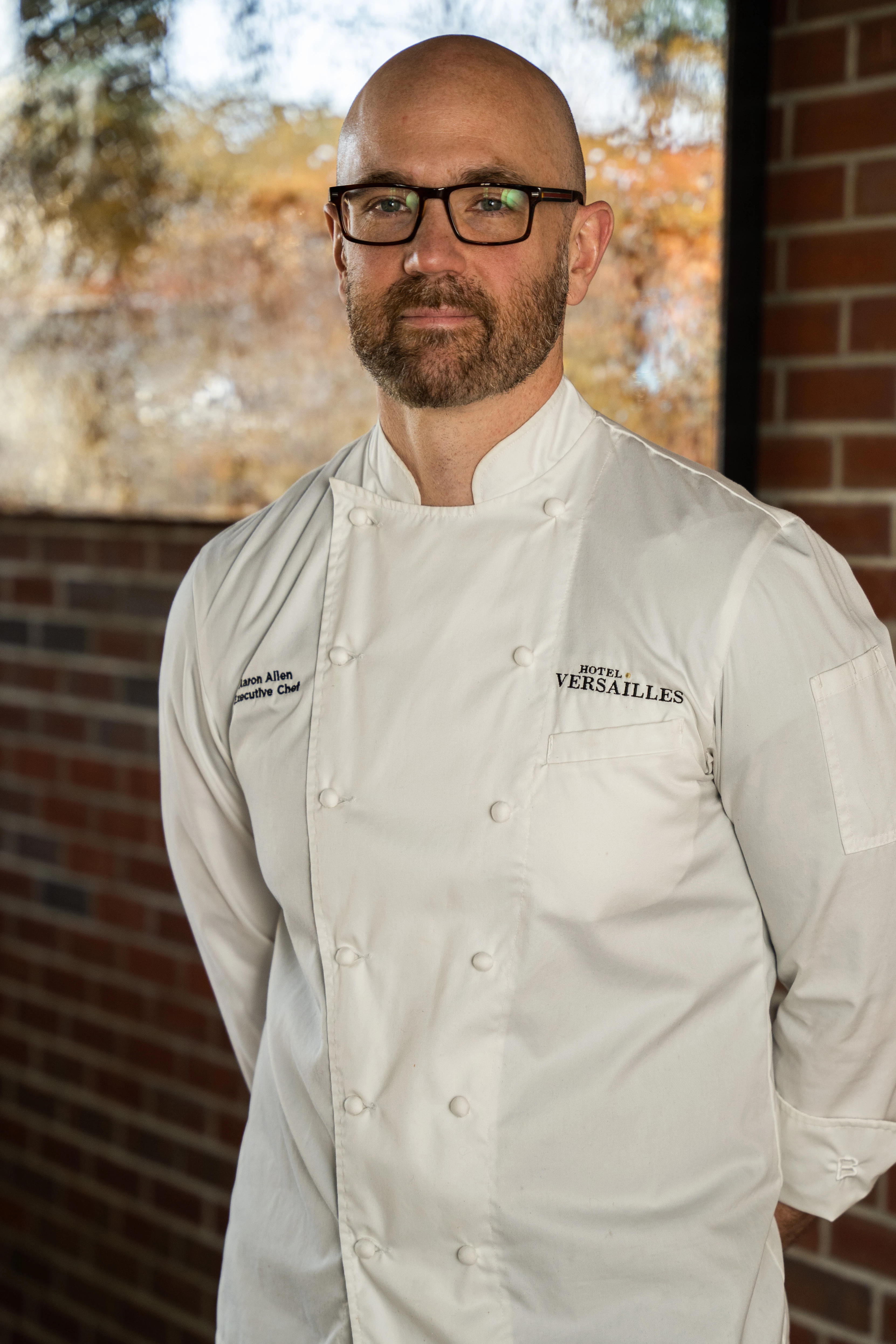 a man wearing a chef's coat