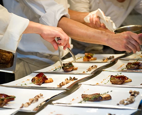a group of chefs preparing food