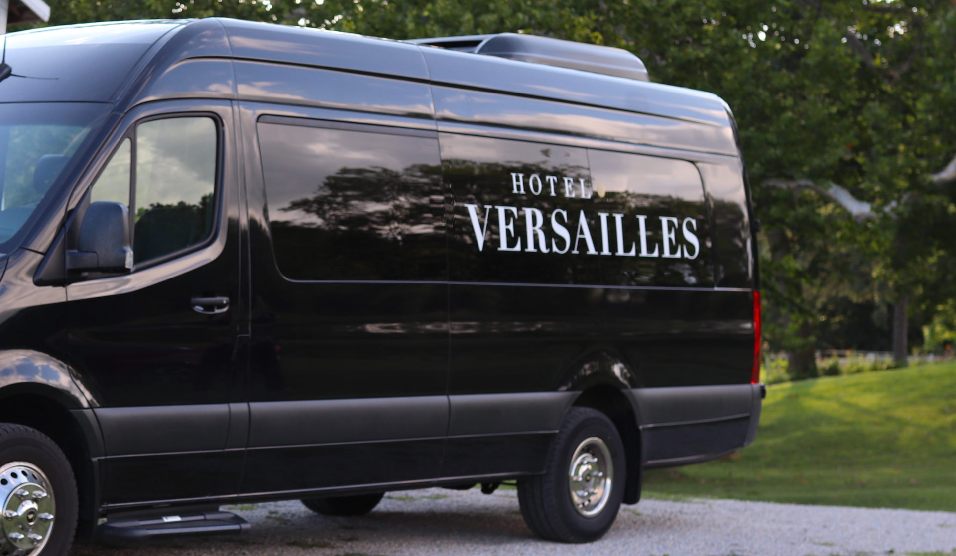 a black van with white text on it
