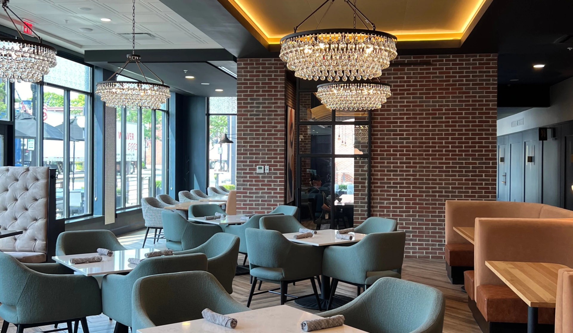a chandelier from a ceiling in a restaurant