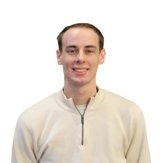 a man smiling for a picture