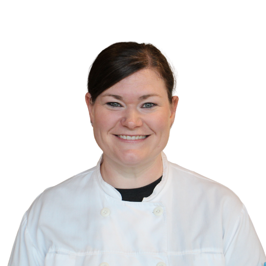 a woman in a white coat