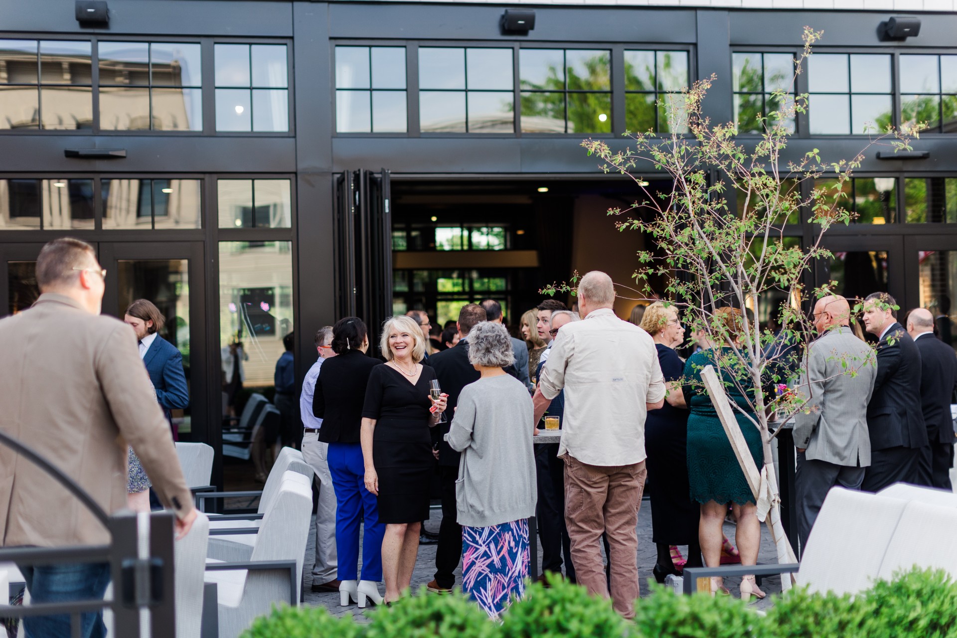 a group of people standing outside a building