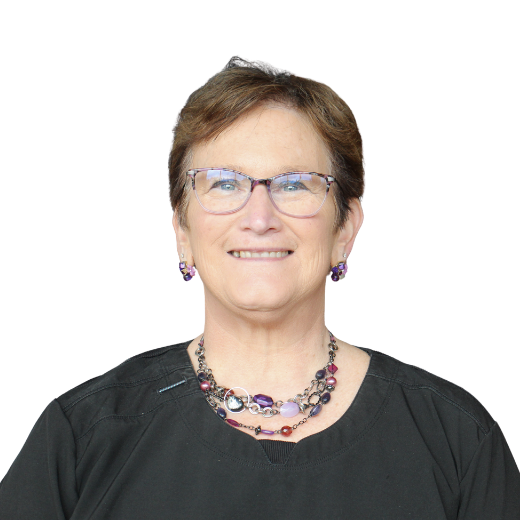 a woman wearing glasses and a necklace