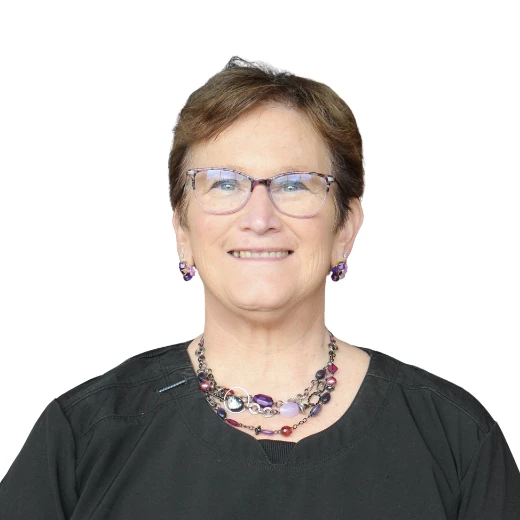 a woman wearing glasses and a necklace
