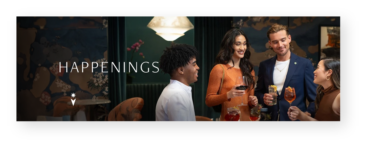 a man and woman holding wine glasses