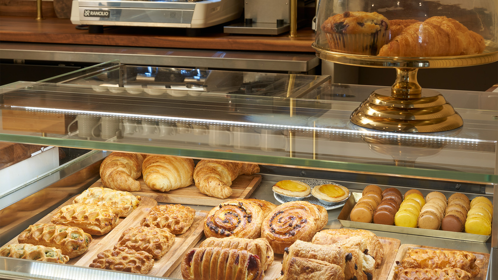 a display case with pastries and pastries