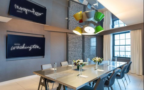 a room with a table and chairs
