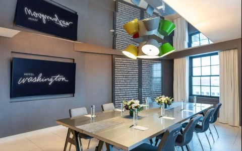 a room with a table and chairs