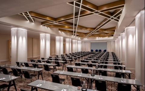 a room with tables and chairs